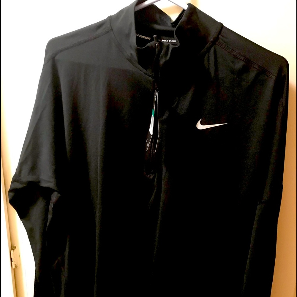 NWT Nike 1/4 zip reflective top